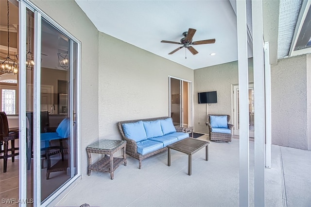 view of patio / terrace with ceiling fan and an outdoor hangout area