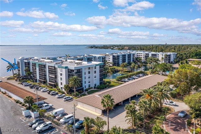 drone / aerial view with a water view