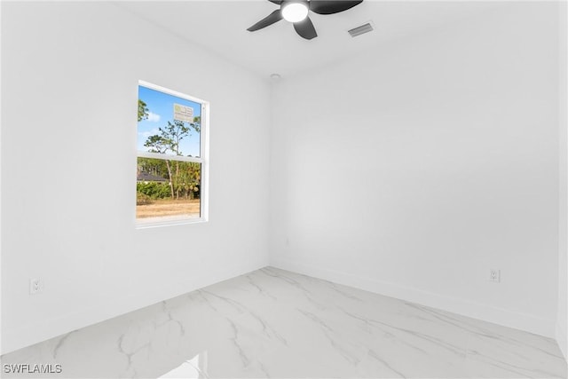 empty room featuring ceiling fan