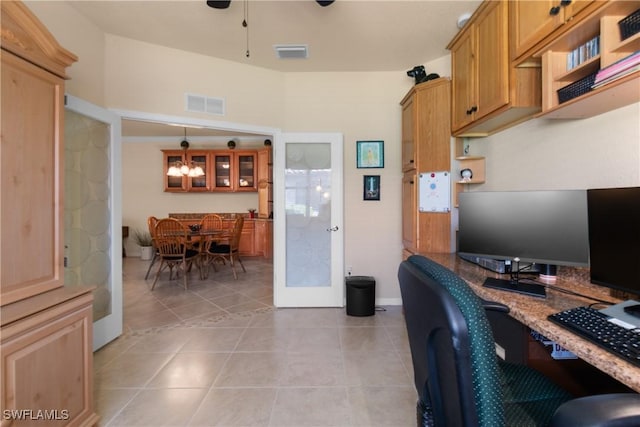 tiled office space with french doors and ceiling fan