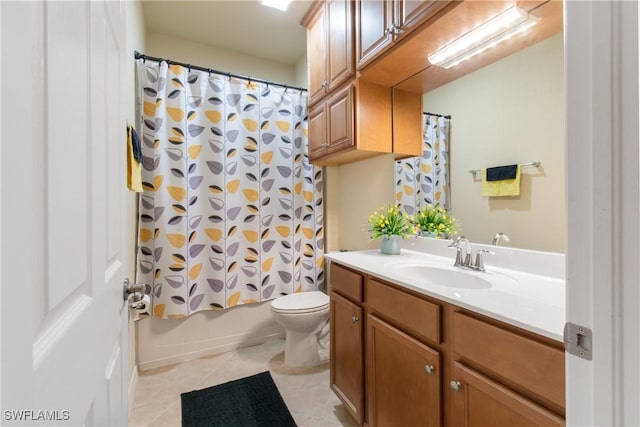 full bathroom featuring tile patterned floors, vanity, toilet, and shower / bathtub combination with curtain