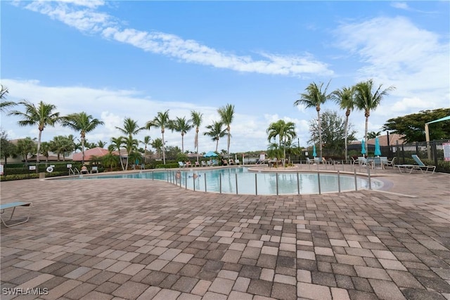 view of swimming pool with a patio area