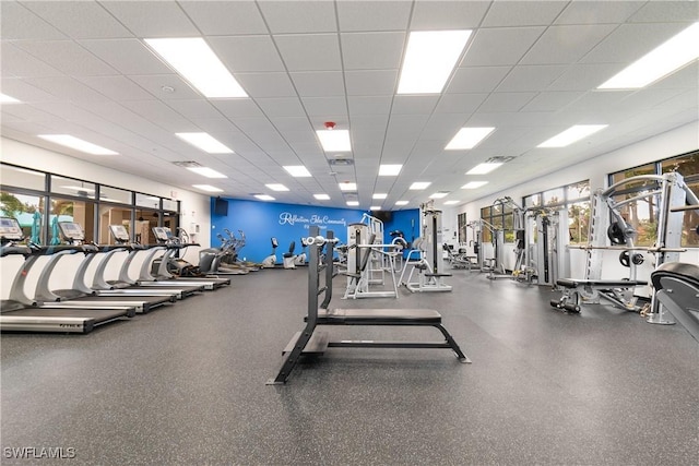 gym with a drop ceiling