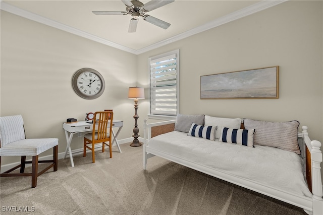 sitting room with light carpet, ceiling fan, and ornamental molding