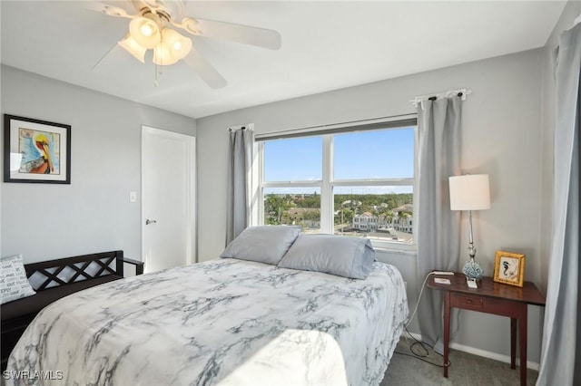 bedroom featuring ceiling fan and carpet floors