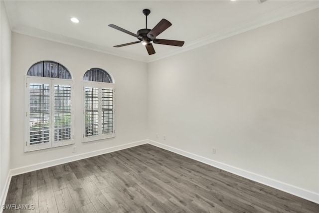 unfurnished room with ceiling fan, dark hardwood / wood-style floors, and ornamental molding