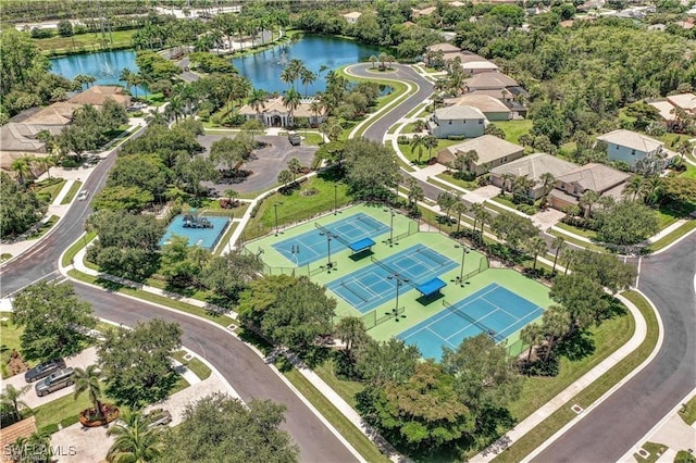 bird's eye view featuring a water view and a residential view