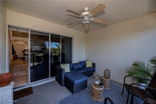 view of patio / terrace featuring an outdoor living space and ceiling fan