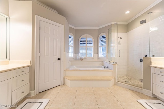 bathroom featuring tile patterned flooring, vanity, ornamental molding, and independent shower and bath