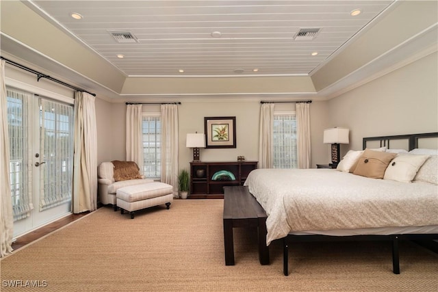 bedroom with a raised ceiling, ornamental molding, wooden ceiling, and access to exterior