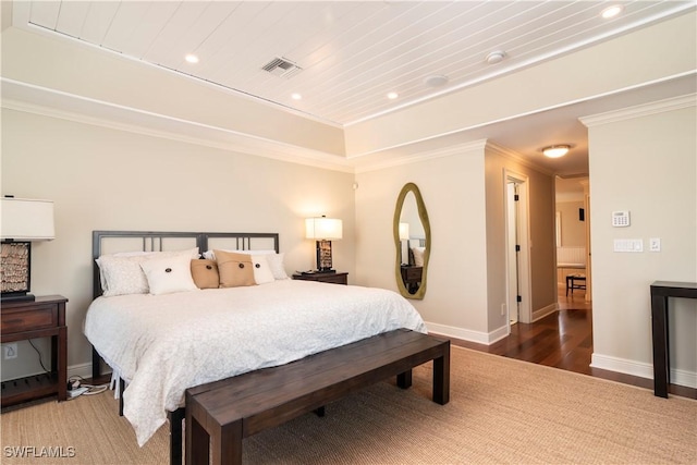 bedroom with dark wood-type flooring, wood ceiling, and crown molding