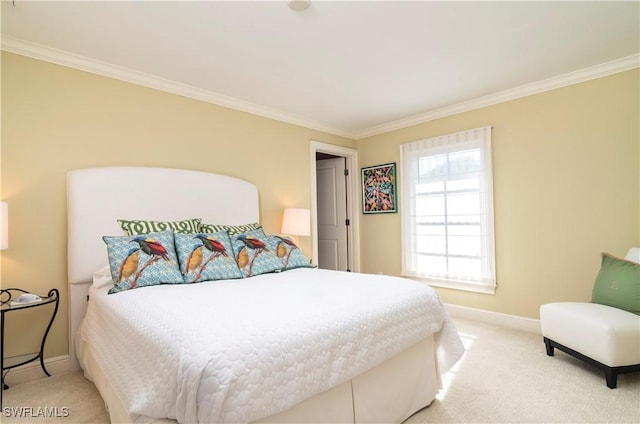 bedroom with crown molding and carpet floors