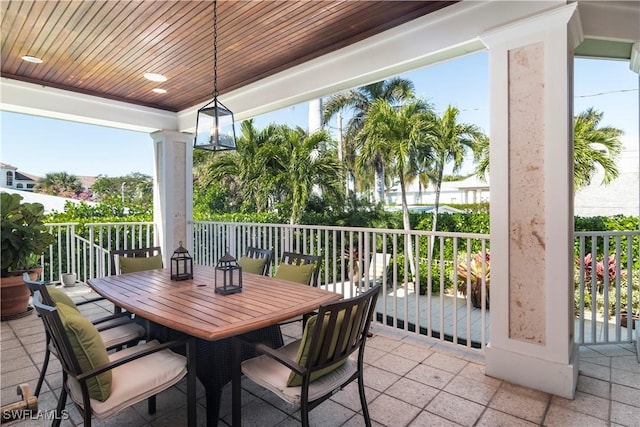 view of patio featuring a balcony