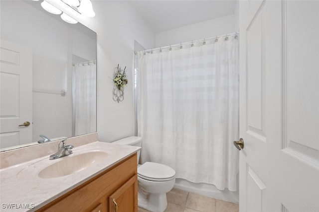 full bathroom with toilet, shower / tub combo, tile patterned floors, and vanity