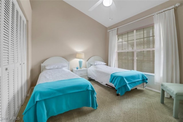 bedroom featuring ceiling fan, lofted ceiling, and carpet floors