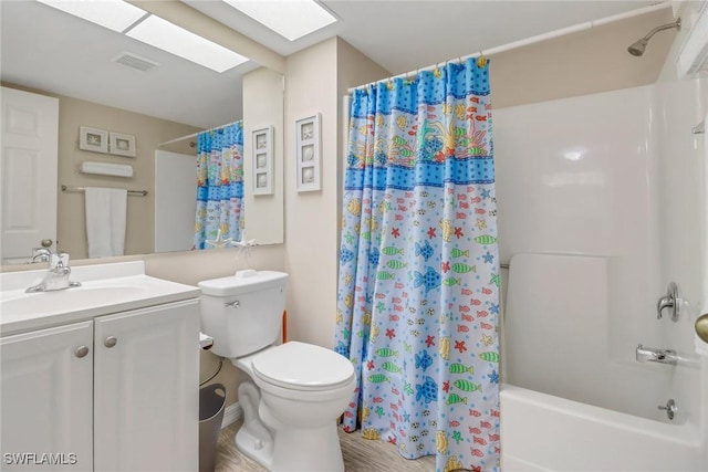 full bathroom featuring vanity, toilet, and shower / bathtub combination with curtain