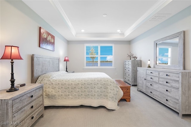 carpeted bedroom featuring a raised ceiling and crown molding