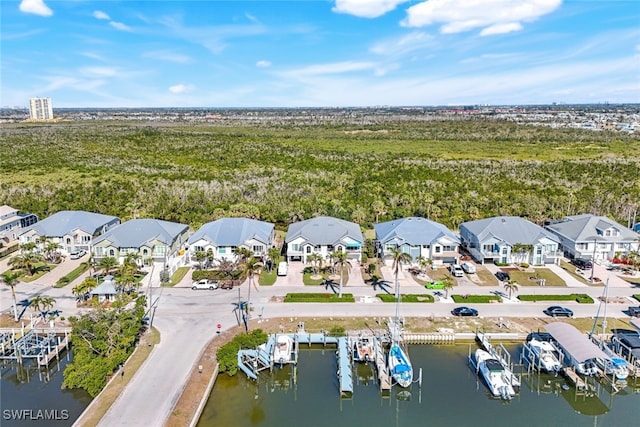 aerial view featuring a water view and a residential view