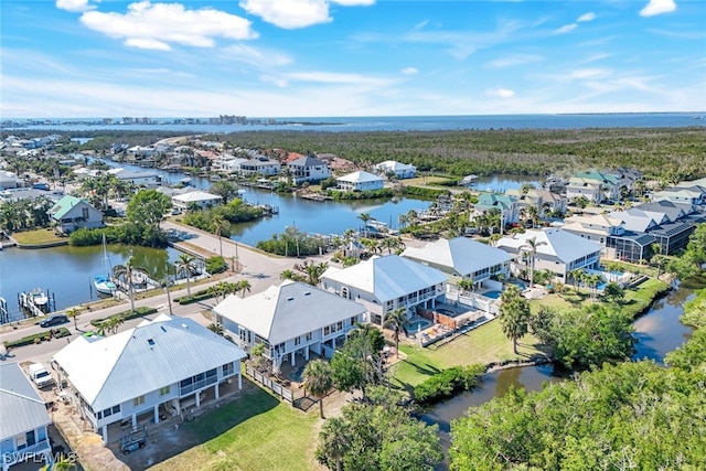 aerial view with a water view and a residential view