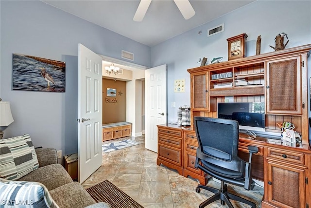 office space with ceiling fan with notable chandelier