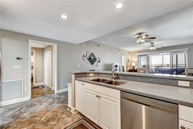 kitchen featuring sink, ceiling fan, white cabinetry, and dishwasher