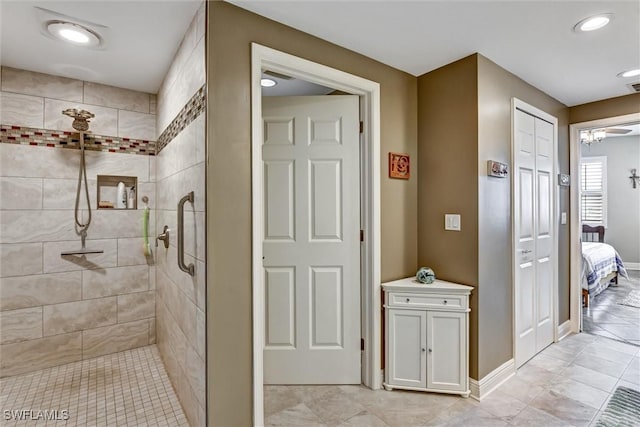 bathroom featuring tiled shower