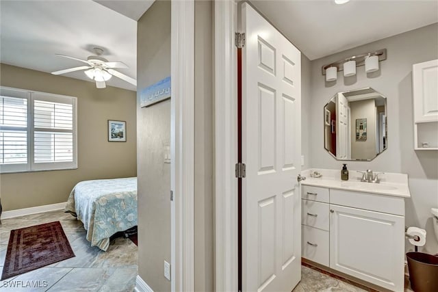 bathroom featuring vanity and ceiling fan