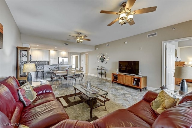 living room with ceiling fan