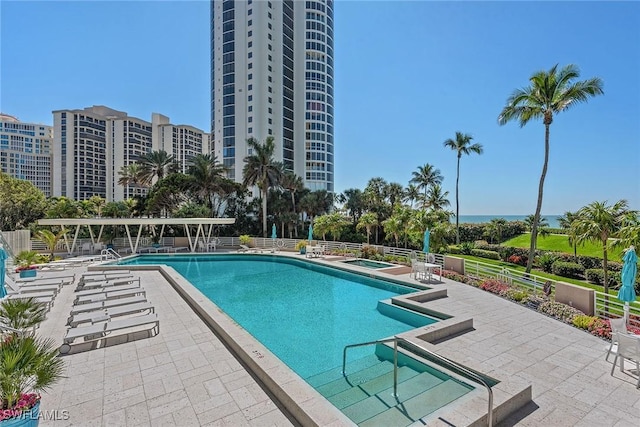 view of swimming pool with a patio