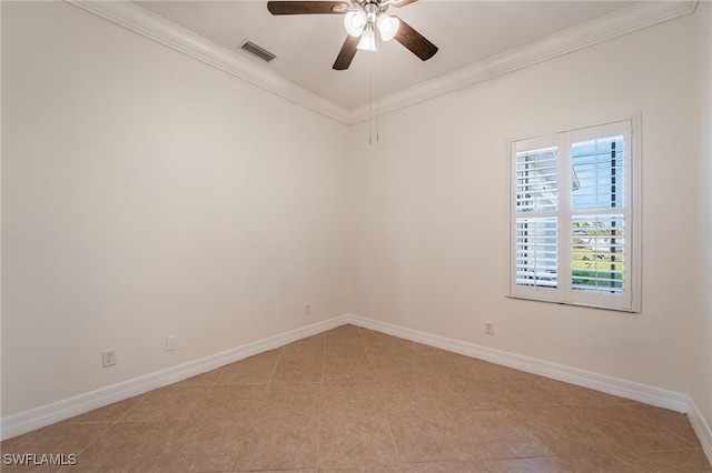 spare room featuring crown molding and ceiling fan