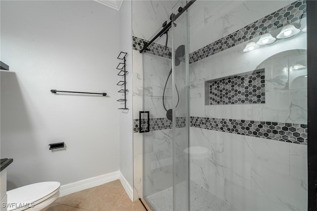 bathroom featuring tile patterned flooring, toilet, and walk in shower