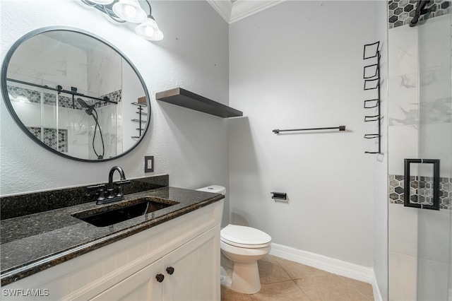bathroom featuring vanity, an enclosed shower, tile patterned floors, and toilet