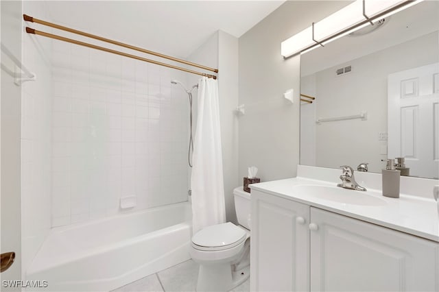 full bathroom with tile patterned flooring, shower / tub combo, vanity, and toilet