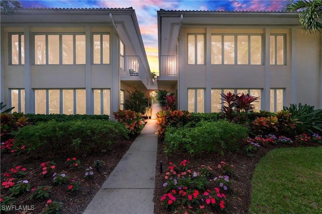 exterior space featuring stucco siding