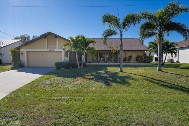 ranch-style home featuring a front yard, central AC, and a garage