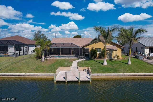 dock area featuring a lanai, a lawn, and a water view