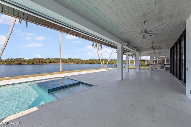 view of pool featuring an in ground hot tub, a patio, a water view, and ceiling fan