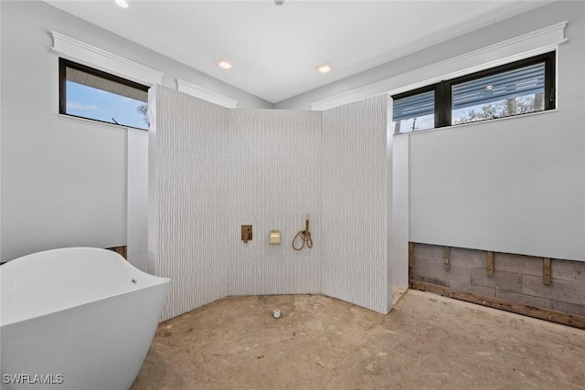 bathroom featuring a tub