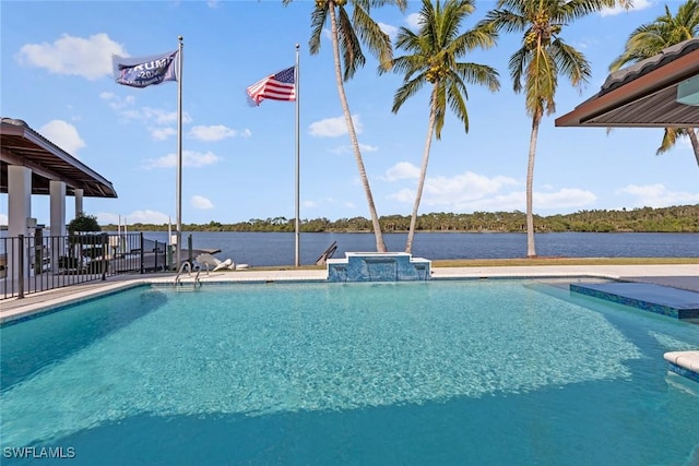 view of pool featuring a water view