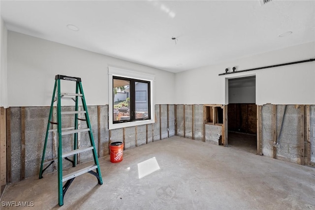 interior space with concrete floors