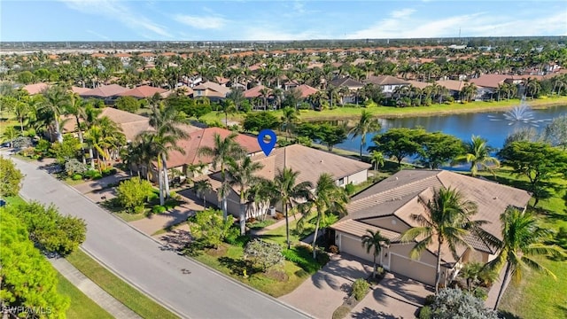 drone / aerial view featuring a water view