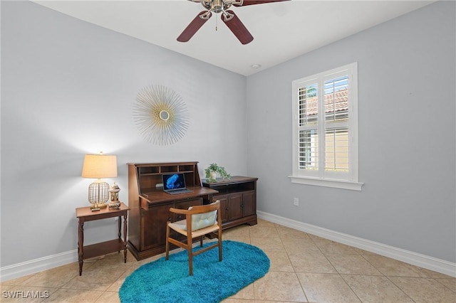 office space with light tile patterned floors and ceiling fan