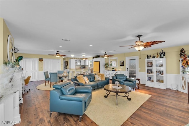 living room featuring dark hardwood / wood-style flooring