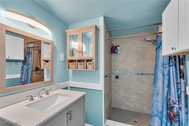 bathroom with vanity and walk in shower