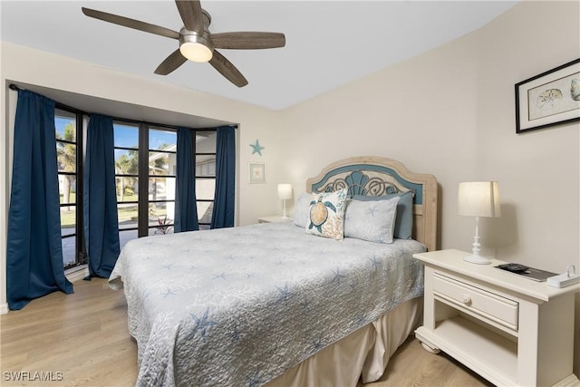 bedroom with light hardwood / wood-style floors and ceiling fan