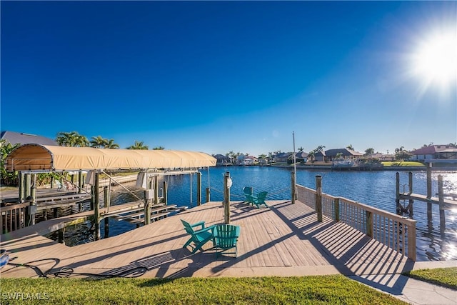 dock area with a water view