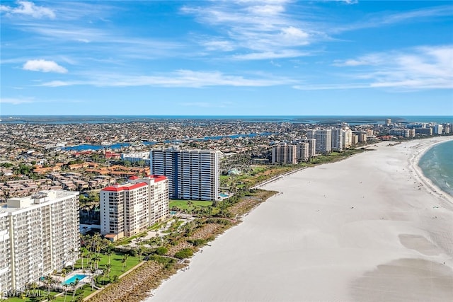 drone / aerial view with a view of the beach and a water view