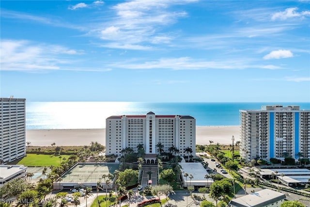 bird's eye view featuring a beach view and a water view