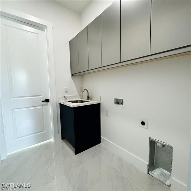 laundry area with washer hookup, sink, cabinets, and hookup for an electric dryer