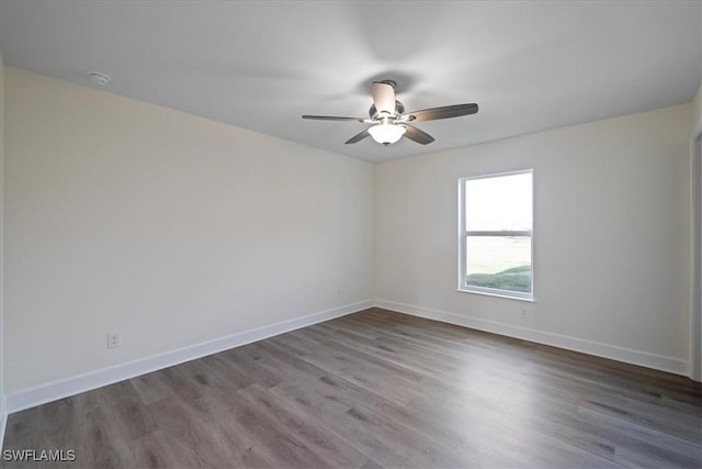 unfurnished room featuring hardwood / wood-style flooring and ceiling fan